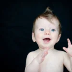 Smiling baby with blue eyes