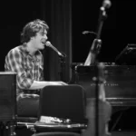 Male Singer on the Piano