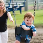 Child enjoys swing